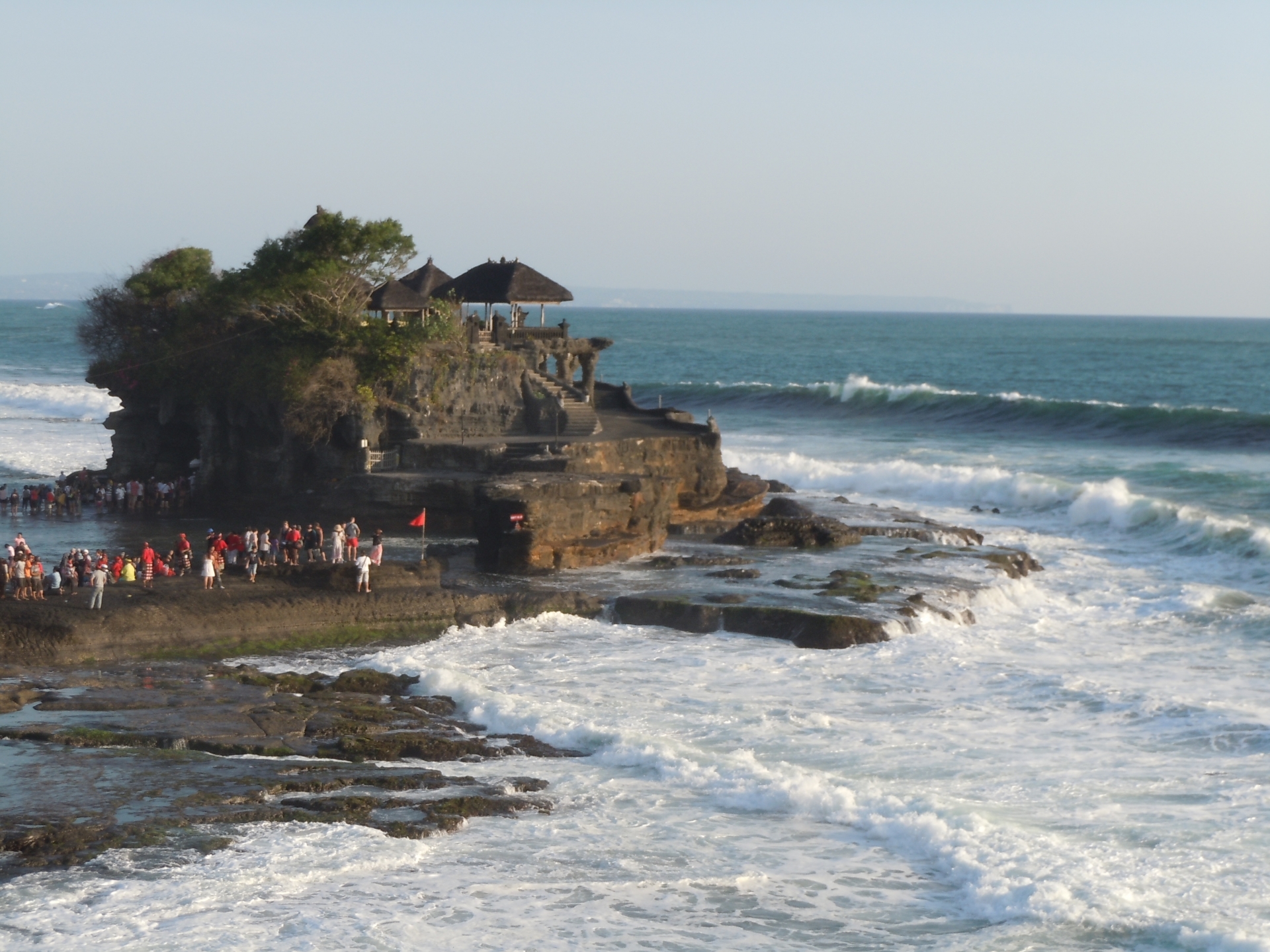 Tanah Lot sea temple in Bali with ocean waves